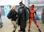 Black Canary, The Question, and the excellent Deadpool photobomb